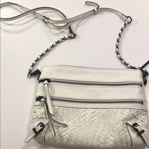 White crossbody bag with black metal